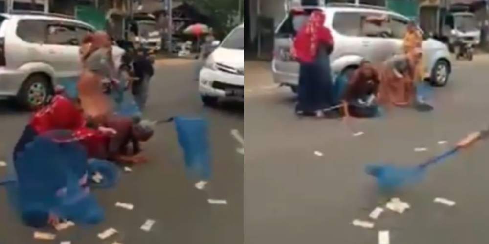 Viral Pengendara Mobil Sebar Uang Rp100 Ribu di Tengah Jalan, Warga Kompak Tangkap Pakai Jaring